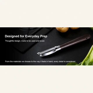 ANGEER wood-handle I-shape peeler in a supplied everyday-prep scene
